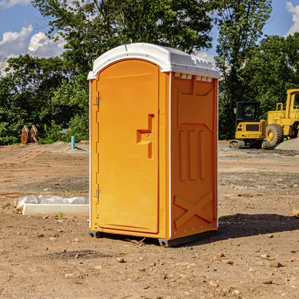 what is the cost difference between standard and deluxe portable toilet rentals in Myra